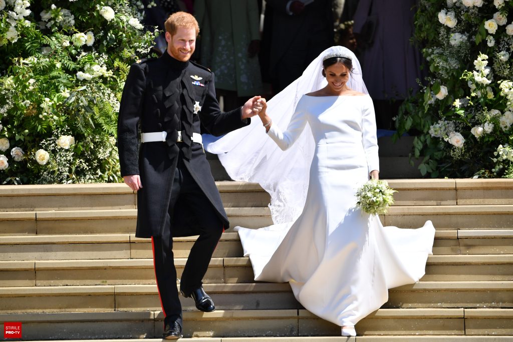 Meghan Markle şi Prinţul Harry au marcat 8 ani de căsnicie cu imagini rare din culisele nunţii regale. GALERIE FOTO