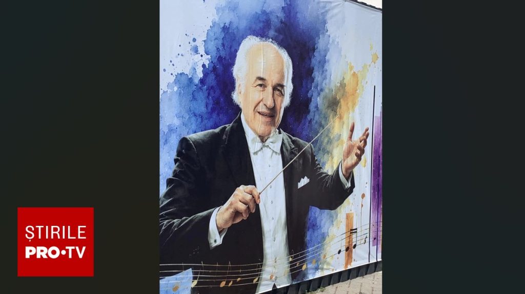 Eugen Doga, cu șase degete la o mână și patru la cealaltă pe un banner din Chișinău. Primăria recunoaște „greșeala”